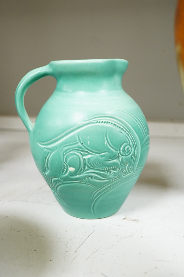 A Susie Cooper incised jug, 22cm high and similar bowl, each incised with animals (2)